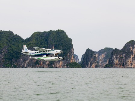 Admiring charming beauty of Ha Long Bay from the most modern seaplane in Vietnam
